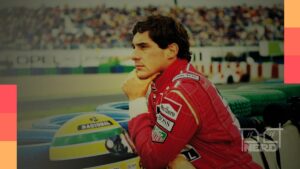 Ayrton Senna sorrindo no cockpit de um carro de Fórmula 1alt