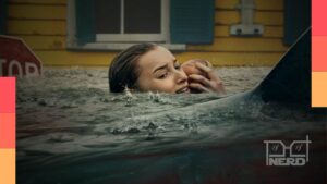 Phoebe Dynevor em Ataque Brutal, filme da Netflix com tubarões durante inundação em Annieville