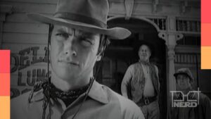 Clint Eastwood como Rowdy Yates em Rawhide, com clima de faroeste e cidade ao fundo