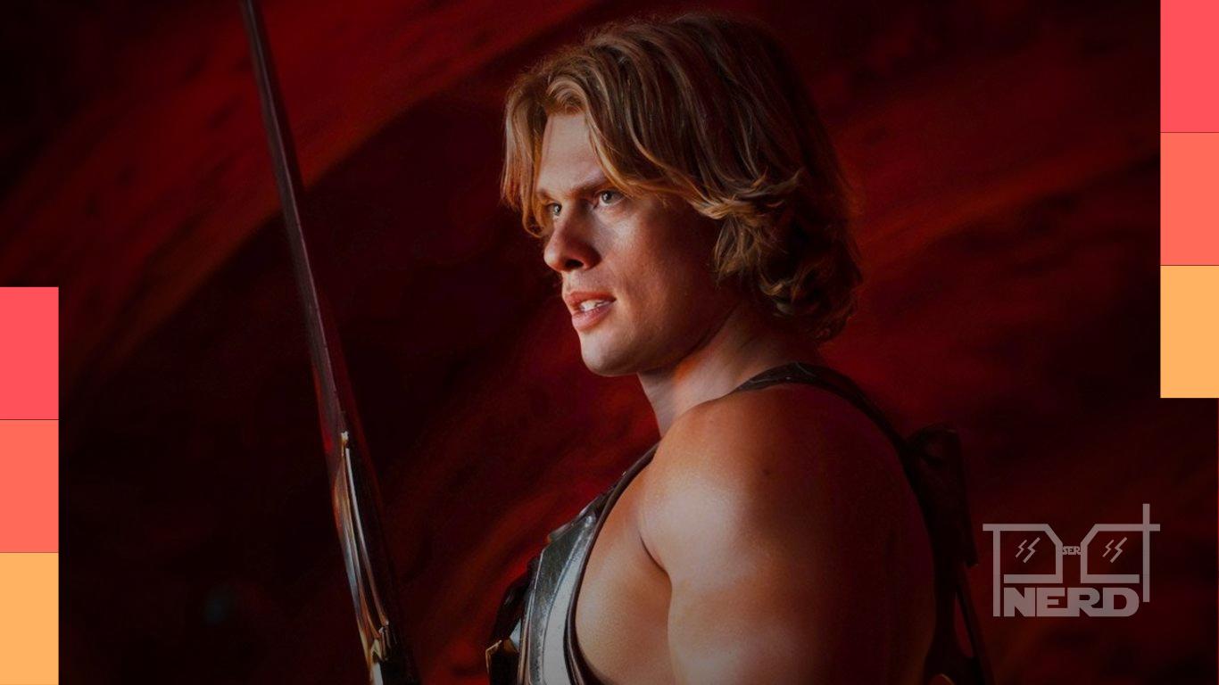 Capa com um personagem estilo He-Man e elementos de brinquedos representando filmes baseados em mercadorias