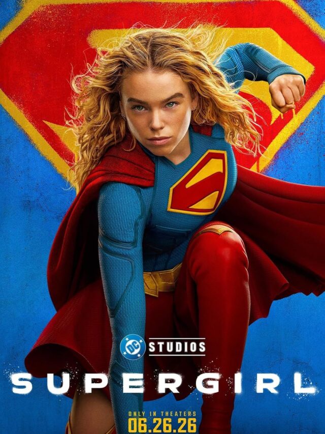 Milly Alcock vestindo o traje clássico de Supergirl encarando o mercenário Lobo, interpretado por Jason Momoa, em uma cena espacial do filme.