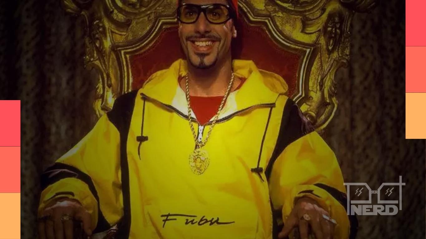 Pôster oficial do filme Who Iz I, com o personagem Ali G, anunciando que o trailer será divulgado amanhã