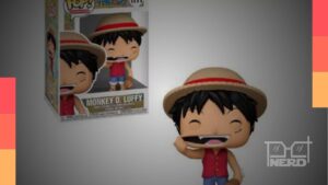 Monkey D. Luffy Funko Pop segurando um pedaço de carne, em caixa tipo window-box