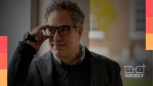 Mark Ruffalo em foto de divulgação e destaque para alerta sobre fusão Warner Paramount ligado à Oracle