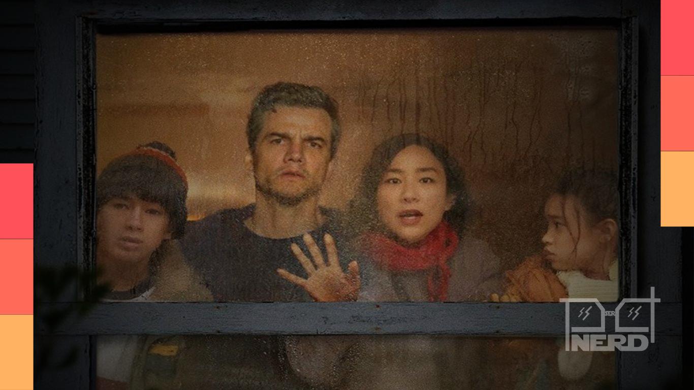 Foto promocional de A Última Casa, com Wagner Moura, Greta Lee e outros atores em clima de suspense na Netflix