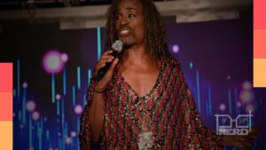 Billy Porter caracterizado como o estilista Magno Stift no filme Jogos Vorazes: Amanhecer na Colheita.
