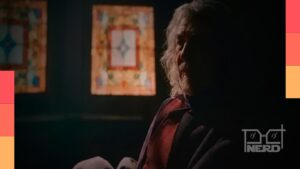 Colecionável de Magneto interpretado por Ian McKellen sobre uma plataforma com o símbolo dos X-Men, segurada pela mão de um Sentinela.
